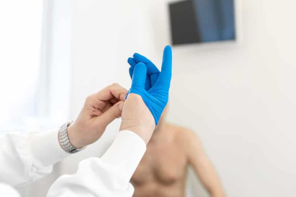 prostate massage, doctor putting gloves