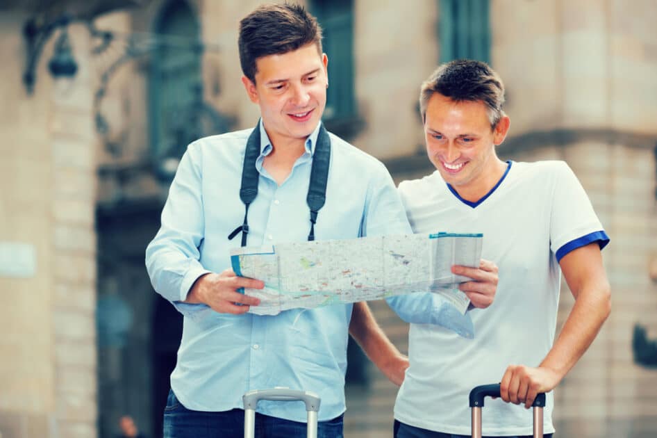 two men looking at the map