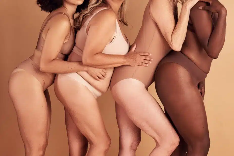 four woman in different shape and skin tone