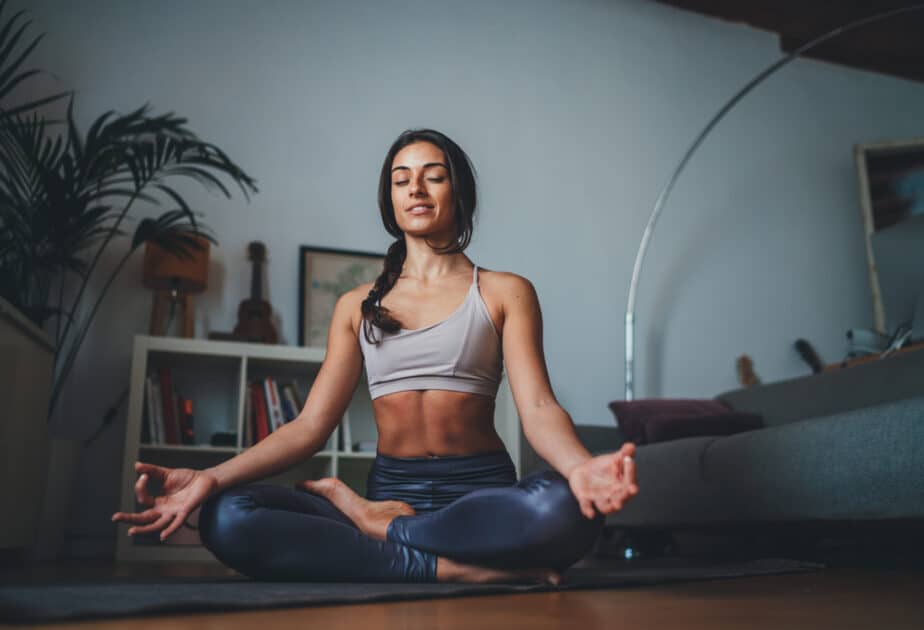 Beautiful woman performing yoga 