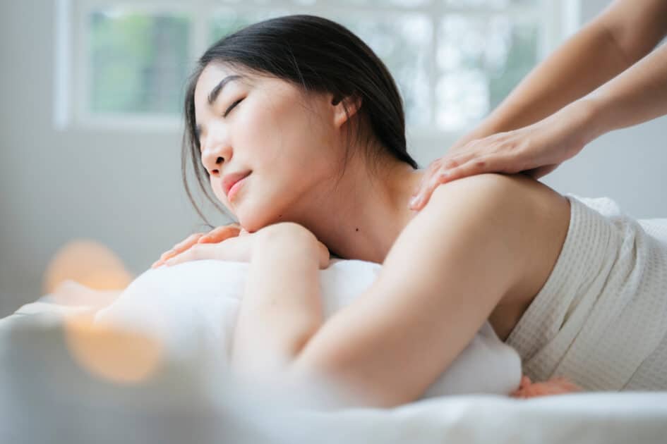 woman having a best for stress massage in spa