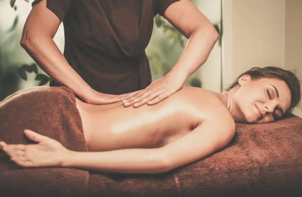 Woman relaxing with a back massage and Mental Health Wellness