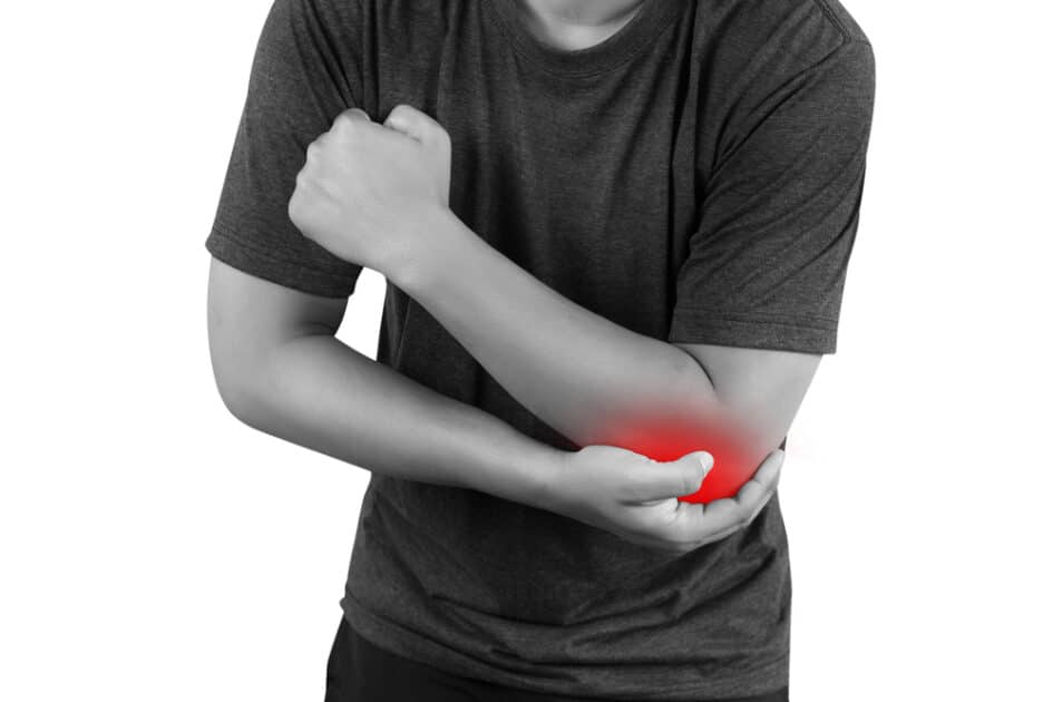 man having pain in tennis elbow