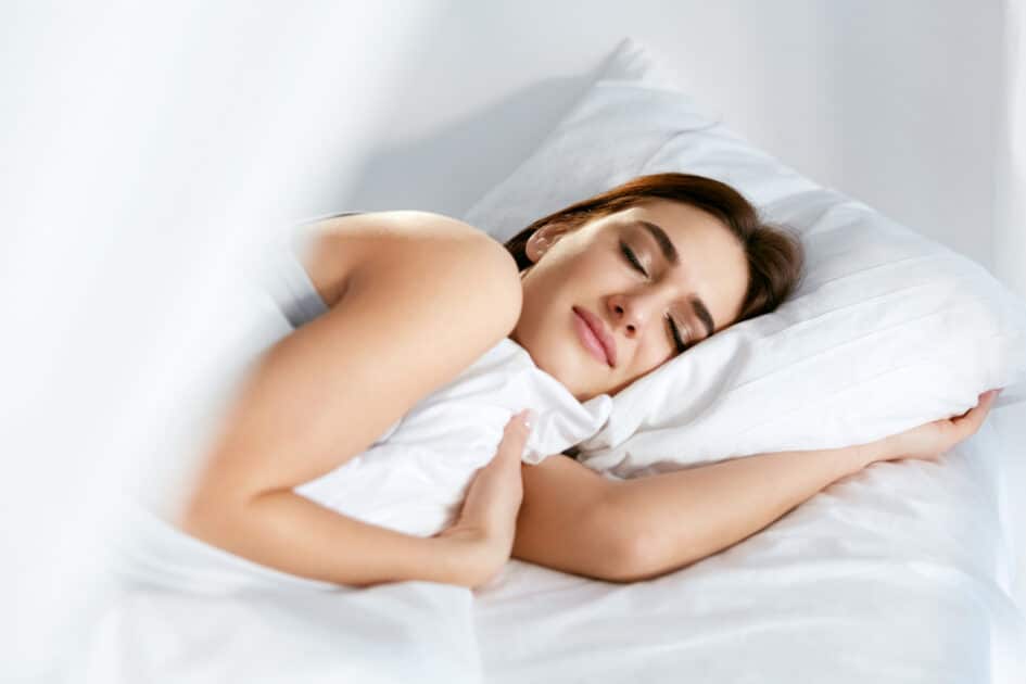 woman having a quality sleep after massage