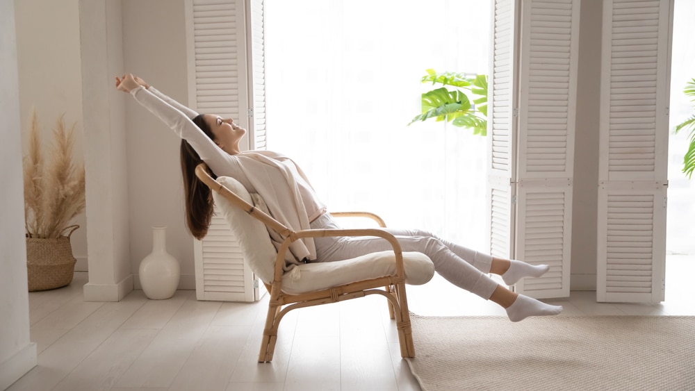 stress free woman sitting in the chair 