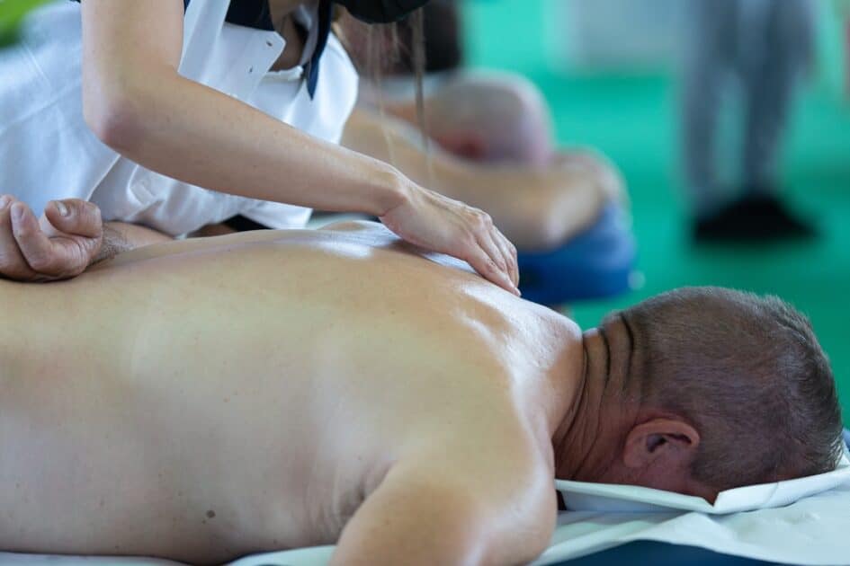 Man having back neuromuscular massage therapy