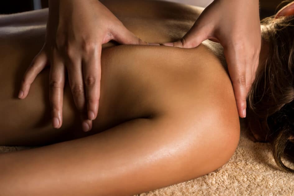 Woman having Deep tissue massage.