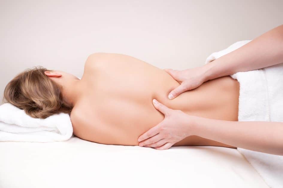 Woman having a  Back Petrissage Massage