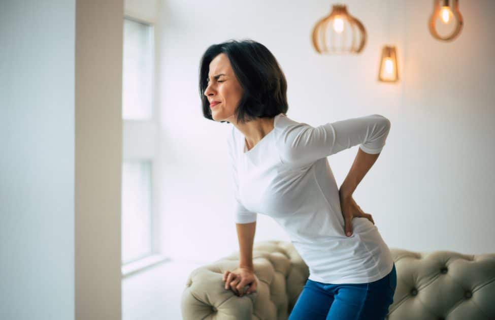 woman having a back Chronic Pain