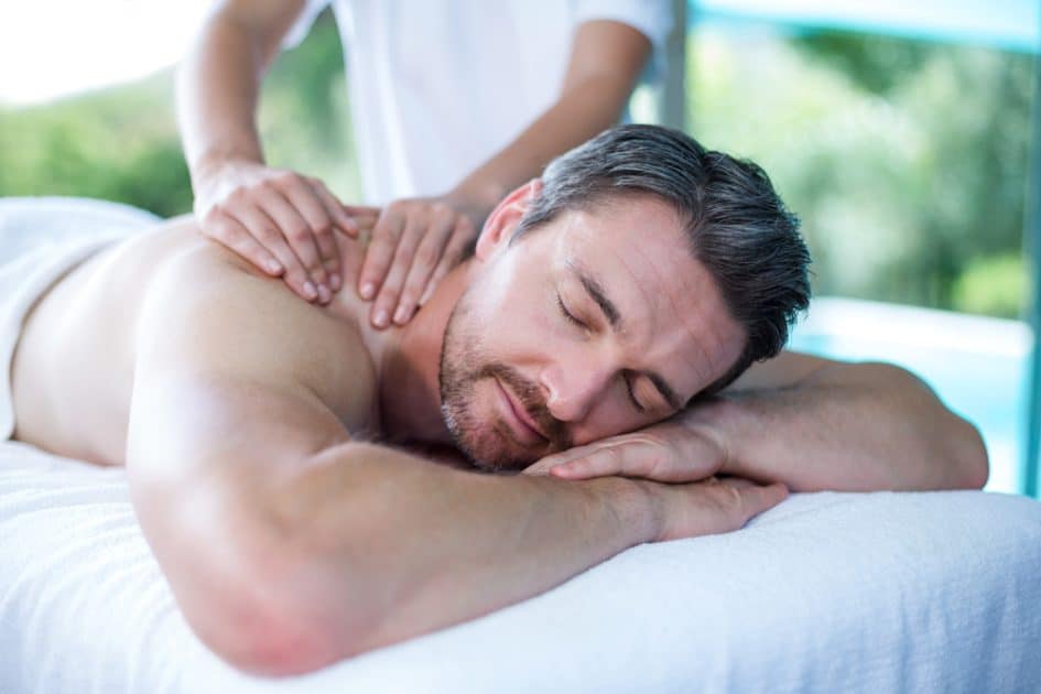 Gay Massage in Key West Man relaxing with Back Massage