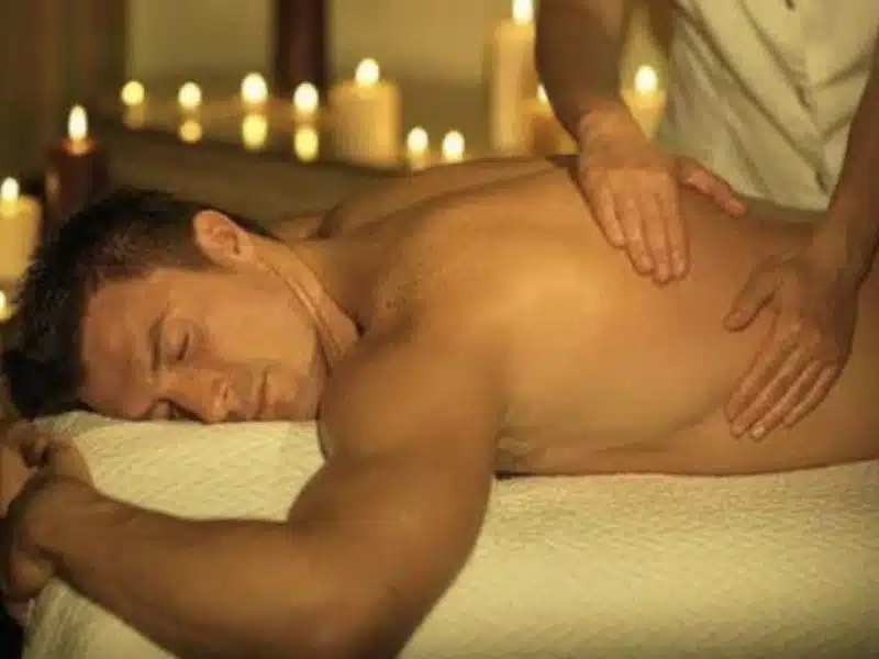 gay massage, man being massaged
