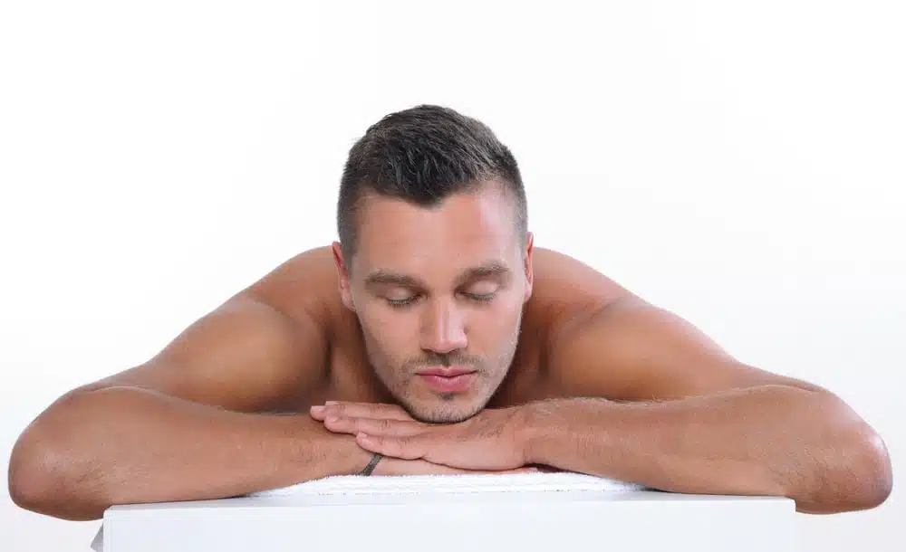 Man relaxing in spa.