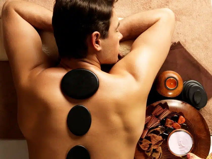 Man enjoying hot stone massage