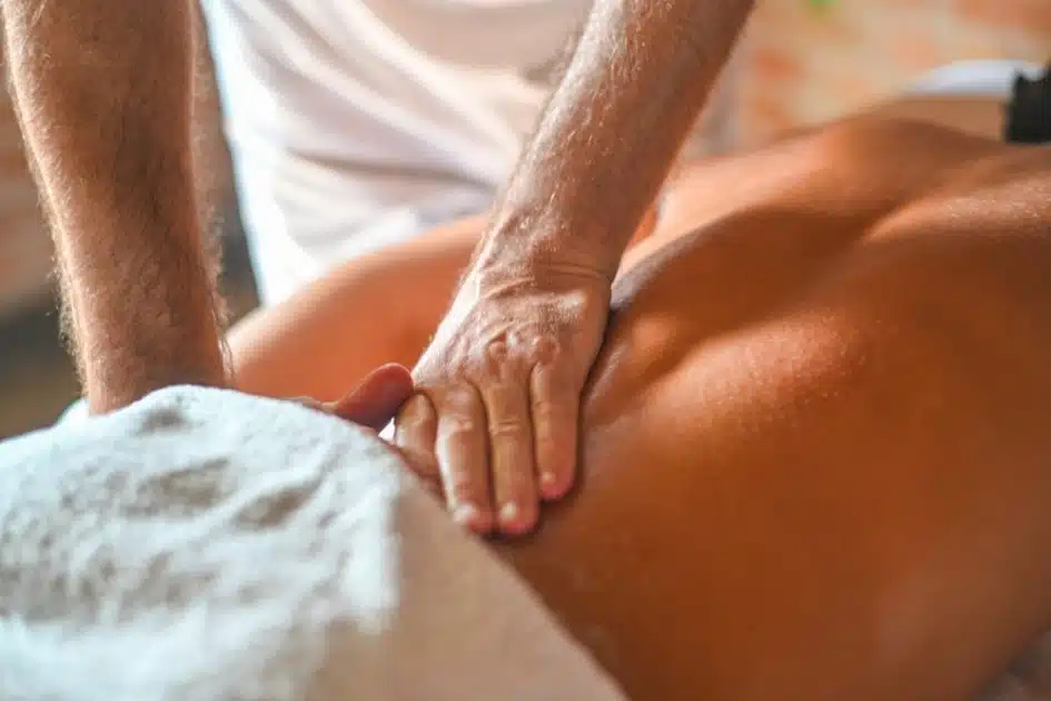 hands man massaging back massage.