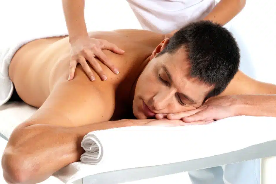 man relaxing with back massage